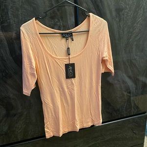 🔴 Peach angel apparel shirt